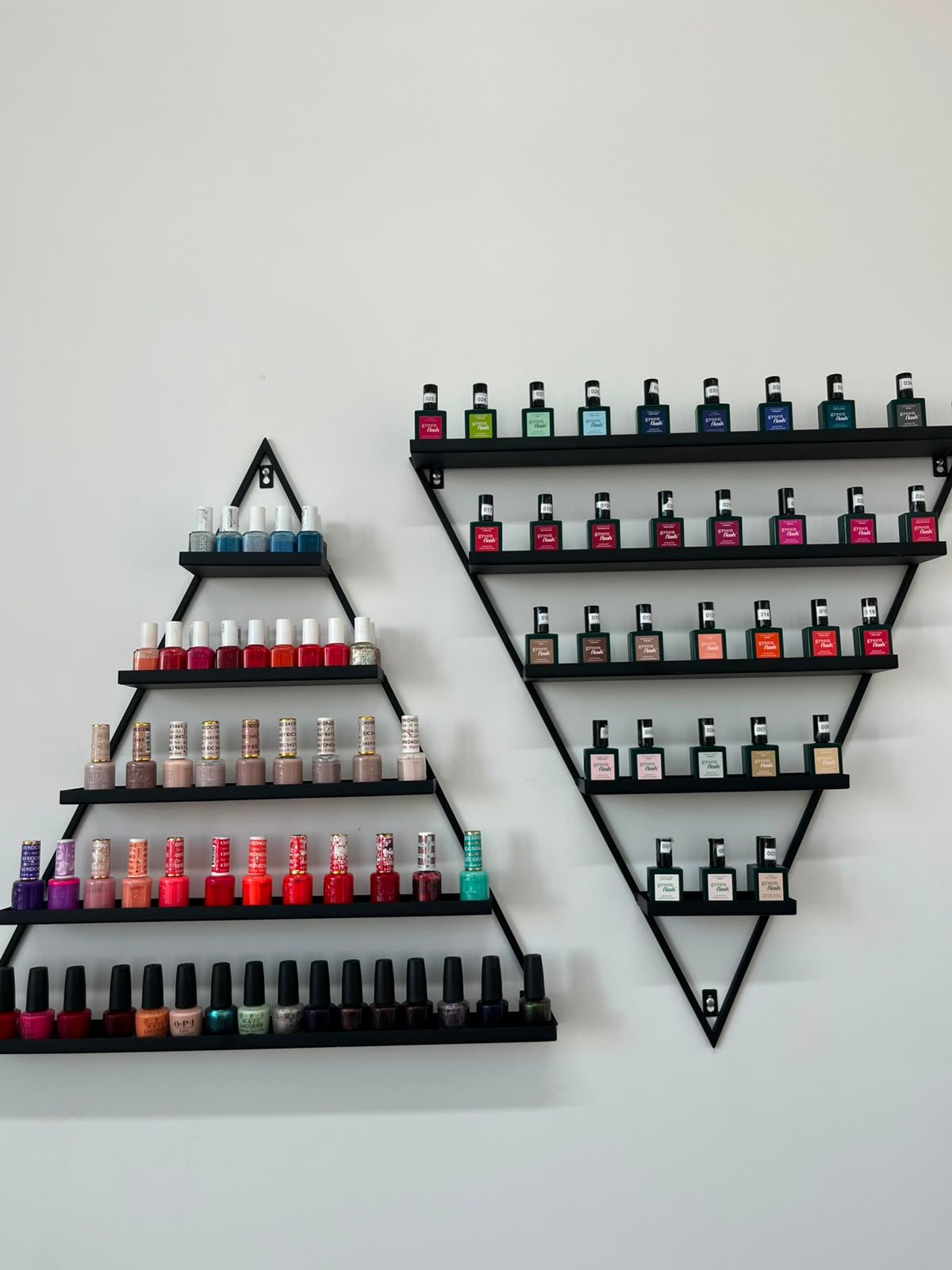 Curated nail polish display at Maison Deni